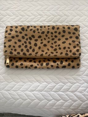 Animal print clutch with gold shoulder strap